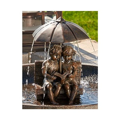 Statue of Boy & Girl Reading On Bench with Umbrella Included